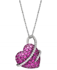 Everyone wants to be in love. Embrace it with this heart-shaped stunner. Crafted in sterling silver, round-cut rubies (2-1/2 ct. t.w.) and swirls of round-cut diamonds (1/5 ct. t.w.) create a magical look. Approximate length: 18 inches. Approximate drop: 3/4 inch. Everyone wants to be in love. Embrace it with this heart-shaped stunner. Crafted in sterling silver, round-cut rubies (2-1/2 ct. t.w.) and swirls of round-cut diamonds (1/5 ct. t.w.) create a magical look. Approximate length: 18 inches. Approximate drop: 3/4 inch.