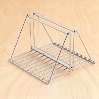 A18/10 stainless steel napkin holder features modern styling, and function. Has easy to carry handle, and weighted center bar to hold napkins in place, but still easy to remove when needed. A18/10 stainless steel napkin holder features modern styling, and function. Has easy to carry handle, and weighted center bar to hold napkins in place, but still easy to remove when needed.