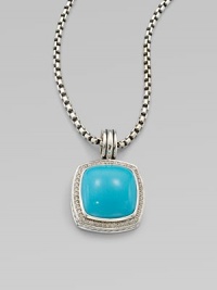 From the Albion Collection. Dazzling diamonds surround this smooth, domed turquoise stone set in sterling silver. TurquoiseDiamonds, .48 tcwSterling silverSize, about ½ Sterling silver baleImported Please note: Chain sold separately. From the Albion Collection. Dazzling diamonds surround this smooth, domed turquoise stone set in sterling silver. TurquoiseDiamonds, .48 tcwSterling silverSize, about ½ Sterling silver baleImported Please note: Chain sold separately.