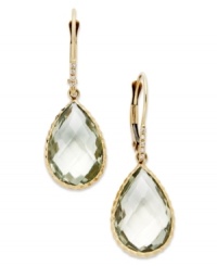 Take your look to the next level with the right amount of color. Pear-cut green quartz (10 ct. t.w.) adds the sparkle to these shining 14k gold earrings with diamond accents. Approximate drop: 1-1/4 inches.