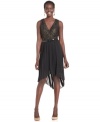 SL Fashions' petite dress is on-trend with a shimmering metallic lace bodice and a pleated high-low skirt.