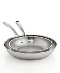 A busy kitchen's defining moments. Meet your prep stars-two stainless steel dishwasher-safe fry pans step up to an endless list of tasks with the ease & versatility of true professionals. With aluminum encapsulated impact-bonded bases, this set heats up fast & evenly and enhances moisture circulation for tender, flavor-rich results. Limited lifetime warranty.