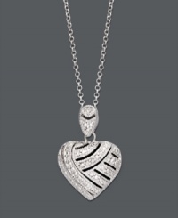 A look you'll simply adore. Victoria Townsend's lovable heart pendant shines with the addition of sparkling diamonds accents. Setting and chain crafted in sterling silver. Approximate length: 18 inches. Approximate drop: 8/10 inch. A look you'll simply adore. Victoria Townsend's lovable heart pendant shines with the addition of sparkling diamonds accents. Setting and chain crafted in sterling silver. Approximate length: 18 inches. Approximate drop: 8/10 inch.