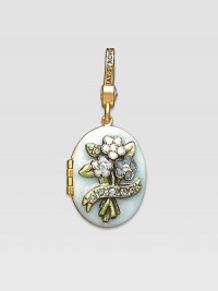 Aquamarine-colored CRYSTALLIZED - Swarovski Elements sparkle on this handcrafted, hand-enameled birthstone locket that opens to hold a favorite photo. Crystal Enamel 18k goldplated brass & brass-plated pewter Month indicated on the back Length, about 1¼ Width, about 1 Spring clip clasp Made in USA