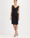 A bejeweled straight pin secures the draping on this ultra-flattering design.Crossover neckline Pleating on bodice Side drape with jeweled detail Concealed center back zip Back vent Fully lined About 24 from natural waist 68% acetate/32% polyester Dry clean Imported