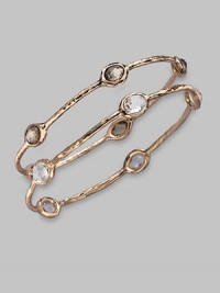 Five faceted ovals of shimmering clear quartz sit within a hammered bangle of 18k gold and sterling silver with a glowing finish of 18k rose goldplating. Clear quartz An alloy of 18K gold and sterling silver plated with 18K rose gold Diameter, about 2¾ Imported Please note: Bracelets sold separately. Five faceted ovals of shimmering clear quartz sit within a hammered bangle of 18k gold and sterling silver with a glowing finish of 18k rose goldplating. Clear quartz An alloy of 18K gold and sterling silver plated with 18K rose gold Diameter, about 2¾ Imported Please note: Bracelets sold separately.