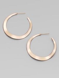 Simple, subtle wavy hoops, in sterling silver and 18k gold, glow with the warm finish of 18k rose goldplating.18k gold and sterling silver with 18k rose goldplatingDrop, about 1½PiercedImported Simple, subtle wavy hoops, in sterling silver and 18k gold, glow with the warm finish of 18k rose goldplating.18k gold and sterling silver with 18k rose goldplatingDrop, about 1½PiercedImported