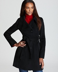 Featuring the latest trend-a convertible collar-this modern DKNY trench coat puts a new spin on the classic silhouette. Wear it belted or not, either way it's a flawless layering for fall and beyond. Featuring the latest trend-a convertible collar-this modern DKNY trench coat puts a new spin on the classic silhouette. Wear it belted or not, either way it's a flawless layering for fall and beyond.