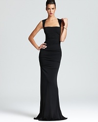 In a figure-flaunting silhouette, Nicole Miller's square neck dress shows off a curve-skimming fabric and an open back. In a figure-flaunting silhouette, Nicole Miller's square neck dress shows off a curve-skimming fabric and an open back.
