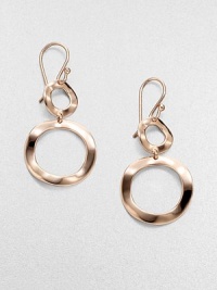 An elegant design of graduated, open ovals in 18k gold and sterling silver with a warm 18k rose goldplating. 18k gold and sterling silver with 18k rose goldplatingDrop, about 1.5Hook backImported 