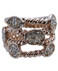 A sophisticated twist. Along with its distinctive twist silhouette, T Tahari's Essentials Collection ring is adorned with sparkling clear crystals in a bezel setting. Crafted in rose gold tone mixed metal, it's nickel-free for sensitive skin. Size 7.