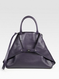 Foldover trapezoid silhouette of rich leather, cinched by a center turn-lock buckle closure.Double top handles, 4¼ dropDetachable adjustable shoulder strap, 23-24½ dropTop snap closure and versatile turn-lock buckle closure, can be tucked into bag for a tote silhouetteProtective metal feetOne inside zip pocketTwo inside open pocketsLinen lining18W X 12¼H X 5DImported Foldover trapezoid silhouette of rich leather, cinched by a center turn-lock buckle closure.Double top handles, 4¼ dropDetachable adjustable shoulder strap, 23-24½ dropTop snap closure and versatile turn-lock buckle closure, can be tucked into bag for a tote silhouetteProtective metal feetOne inside zip pocketTwo inside open pocketsLinen lining18W X 12¼H X 5DImported