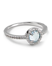 A checkerboard, dome cut center stone with talon prongs is surrounded in sparkling CZ stones on this small-but-statement-making Crislu ring. A checkerboard, dome cut center stone with talon prongs is surrounded in sparkling CZ stones on this small-but-statement-making Crislu ring.