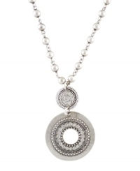 Channel your inner bohemian diva. This hippie-chic pendant by Jessica Simpson features two intricate discs suspended from a delicate beaded chain. Crafted in worn silver tone mixed metal. Approximate length: 18 inches. Approximate drop: 1-1/2 inches. Channel your inner bohemian diva. This hippie-chic pendant by Jessica Simpson features two intricate discs suspended from a delicate beaded chain. Crafted in worn silver tone mixed metal. Approximate length: 18 inches. Approximate drop: 1-1/2 inches.