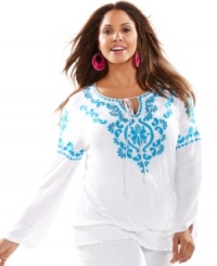 Snag on-trend bohemian style with INC's long sleeve plus size peasant top, featuring an embroidered front. Snag on-trend bohemian style with INC's long sleeve plus size peasant top, featuring an embroidered front.