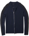 Maybe he'd like to, a guy can't go around in macho motocross gear 24/7. So here's the next best-maybe even better-thing: A zip-up cardigan from Sean John with moto-style ribbing that travels over the shoulders and down the sleeves.