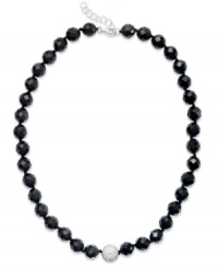 A traditional style with bold, modern appeal. This chunky strand necklace showcases faceted onyx beads (10 mm) and a sparkling crystal ball at center (12 mm). Clasp crafted in sterling silver. Approximate length: 18 inches + 1-inch extender. A traditional style with bold, modern appeal. This chunky strand necklace showcases faceted onyx beads (10 mm) and a sparkling crystal ball at center (12 mm). Clasp crafted in sterling silver. Approximate length: 18 inches + 1-inch extender.