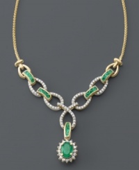 Make like a queen in this royalty-inspired masterpiece. Beautiful oval and round-cut emeralds (1-1/2 ct. t.w.) glisten next to round-cut diamond swirls (1/5 ct. t.w.). Crafted in 14k gold. Approximate length: 18 inches. Approximate drop: 2-1/2 inches. Make like a queen in this royalty-inspired masterpiece. Beautiful oval and round-cut emeralds (1-1/2 ct. t.w.) glisten next to round-cut diamond swirls (1/5 ct. t.w.). Crafted in 14k gold. Approximate length: 18 inches. Approximate drop: 2-1/2 inches.