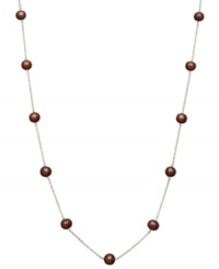 Sumptuous style. Rich chocolate cultured freshwater pearls 6-7 mm) adorn a delicate 14k gold chain on this pretty illusion necklace. Approximate length: 17 inches. Sumptuous style. Rich chocolate cultured freshwater pearls 6-7 mm) adorn a delicate 14k gold chain on this pretty illusion necklace. Approximate length: 17 inches.