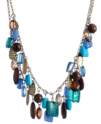 Perfect your party look. Haskell's Brasilian-themed drama necklace combines a wild mix of blue, brown and taupe beads in acrylic, metal and wood. Set in brass-plated mixed metal. Approximate length: 17 inches + 3-inch extender. Approximate drop: 1-1/2 inches. Perfect your party look. Haskell's Brasilian-themed drama necklace combines a wild mix of blue, brown and taupe beads in acrylic, metal and wood. Set in brass-plated mixed metal. Approximate length: 17 inches + 3-inch extender. Approximate drop: 1-1/2 inches.