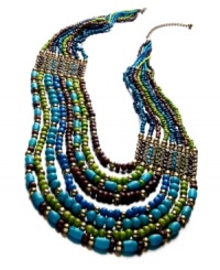 Perfect your party look with bold beading in vibrant colors. Style&co.'s multi-strand statement necklace combines blue, green, and wooden beads in gold tone mixed metal. Approximate length: 22-1/2 inches to 30-1/2 inches + 3-1/2-inch extender. Approximate drop: 3-1/2 inches. Perfect your party look with bold beading in vibrant colors. Style&co.'s multi-strand statement necklace combines blue, green, and wooden beads in gold tone mixed metal. Approximate length: 22-1/2 inches to 30-1/2 inches + 3-1/2-inch extender. Approximate drop: 3-1/2 inches.