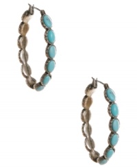 Traditional hoop earrings with an earthy look and feel. Lucky Brand's hippie-chic style combines oval-cut reconstituted turquoise stones in a silver tone mixed metal setting. Approximate diameter: 1-5/8 inches. Traditional hoop earrings with an earthy look and feel. Lucky Brand's hippie-chic style combines oval-cut reconstituted turquoise stones in a silver tone mixed metal setting. Approximate diameter: 1-5/8 inches.