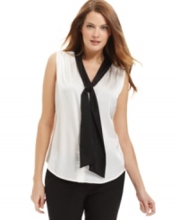 A bold, contrasting tie neckline gives this Calvin Klein top a look that's timeless and modern all at once. A bold, contrasting tie neckline gives this Calvin Klein top a look that's timeless and modern all at once.