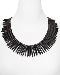 Your look is instantly edgy with this Kenneth Jay Lane spiked necklace, which flaunts a collar of sharply styled pieces. Your look is instantly edgy with this Kenneth Jay Lane spiked necklace, which flaunts a collar of sharply styled pieces.