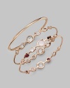 From the Sugar Kissed Collection. Multi shapes of richly faceted clear quartz are elegantly set all around a bangle of sterling silver and 18k gold, finished in the warm glow of 18k rose goldplating.Clear quartz18k gold and sterling silver with 18k rose goldplatingDiameter, about 2½Imported