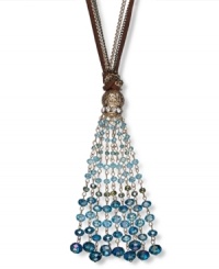 Drops of enchanting color reign on this boho-chic necklace from c.A.K.e by Ali Khan. Adorned with glass faceted turquoise-color rondelle beads (3-8 mm), with a suede cord. Crafted in gold tone mixed metal. Approximate length: 30 inches + 3-inch extender. Approximate drop: 4-1/2 inches. Drops of enchanting color reign on this boho-chic necklace from c.A.K.e by Ali Khan. Adorned with glass faceted turquoise-color rondelle beads (3-8 mm), with a suede cord. Crafted in gold tone mixed metal. Approximate length: 30 inches + 3-inch extender. Approximate drop: 4-1/2 inches.