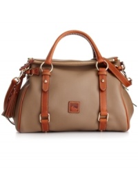 A classic satchel design with equestrian-inspired details is rendered in buttery-soft leather, lending elegant yet easygoing style to any ensemble. Features eye-catching details, such as decorative side tassels, accent buckles and custom hardware. Secure zip-top closure and plenty of internal pockets ensure your belongings stay safe and in place wherever you go.