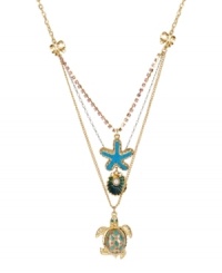 Turtle power. This Betsey Johnson three-row pendant necklace is detailed with gold tone turtle with crystal accents, turquoise starfish, blue oyster with glass pearl accent, gold tone bows and sparkling crystal accents. Three chains crafted in gold tone mixed metal, silver tone mixed metal and pink-colored crystal cups. Approximate length: 16 inches + 3-inch extender. Approximate drop: 3-3/4 inches. Turtle power. This Betsey Johnson three-row pendant necklace is detailed with gold tone turtle with crystal accents, turquoise starfish, blue oyster with glass pearl accent, gold tone bows and sparkling crystal accents. Three chains crafted in gold tone mixed metal, silver tone mixed metal and pink-colored crystal cups. Approximate length: 16 inches + 3-inch extender. Approximate drop: 3-3/4 inches.