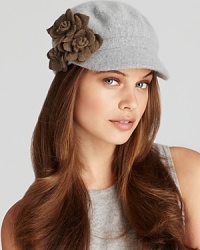 Olive green flowers pop off the light gray background of this cute August Accessories modboy hat. Olive green flowers pop off the light gray background of this cute August Accessories modboy hat.