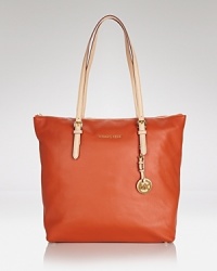 This go-to tote from MICHAEL Michael Kors gets you through your commute with effortless elegance and easy glamour. This go-to tote from MICHAEL Michael Kors gets you through your commute with effortless elegance and easy glamour.