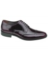 Tonal stitching adds modern stealth to these smooth leather oxford men's dress shoes from Johnston & Murphy.