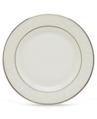 Pure opulence. Posh opalescence. This classically designed line of Lenox dinnerware and dishes is accented by a platinum rim and a delicate flourish of vine-like, white-on-white imprints with raised, iridescent enamel dots. Great gift for a housewarming, wedding or yourself. Bread and butter plate shown top right.