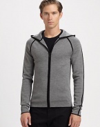 A refined take on the classic hoodie, this warm, finespun wool style is accented with bold contrast detailing.Attached hoodZip frontContrast trimWoolHand washImported