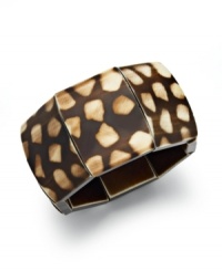 Show your spots. Style&co.'s chic stretch bracelet features an intriguing pattern with brown and white mixed metal. Approximate diameter: 2-1/4 inches. Show your spots. Style&co.'s chic stretch bracelet features an intriguing pattern with brown and white mixed metal. Approximate diameter: 2-1/4 inches.