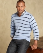 Layer up your summer look with this lightweight v-neck sweater from Tommy Hilfiger.
