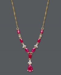 Brighten your look with elaborate design and bold hues. This intricate, y-shaped necklace highlights oval and pear-cut rubies (2-5/8 ct. t.w.) combined with the sparkle of round-cut diamonds (1/10 ct. t.w.). Set in 14k gold. Approximate length: 19 inches. Approximate drop: 1-1/2 inches.