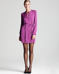 Flaunt effortless elegance in vibrant DIANE von FURSTENBERG stretch-silk dress, cinched at the waistline for a flattering silhouette.