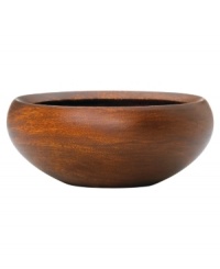 Less is more with this wooden salad bowl from Dansk's collection of serveware and serving dishes. Its simple round shape curves inward to contain mixed greens, lettuce and baby spinach, while the rich wood grain adds all-natural appeal. Less is more with this wooden salad bowl from Dansk's collection of serveware and serving dishes. Its simple round shape curves inward to contain mixed greens, lettuce and baby spinach, while the rich wood grain adds all-natural appeal.