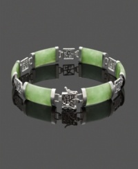 The perfect look to complement your unique style. This beautifully-crafted bracelet highlights rectangular jade links (9 mm x 18 mm) set in polished, sterling silver cut-out symbols. Approximate diameter: 2-3/4 inches.