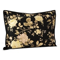 Silhouetted blossoms cascade across a bold black ground with hints of sage, pale yellow and rose on duvets, comforters and shams in this classic bedding collection. Silhouetted blossoms cascade across a bold black ground with hints of sage, pale yellow and rose on duvets, comforters and shams in this classic bedding collection.