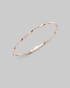 Simply stunning, this 18k rose gold bangle with delicate ridges and twists is great on its own, even better when stacked in multiples. 18k rose goldDiameter, about 2½Tongue-and-groove claspImported