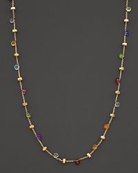 Beautiful multi-colored semi precious stones highlight this delicate 18K yellow gold necklace. Beautiful multi-colored semi precious stones highlight this delicate 18K yellow gold necklace.