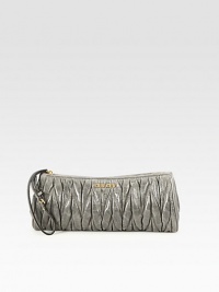 Ruched calfskin zip-top design with an adjustable wristlet strap.Adjustable wristlet strap, 5¼-5¾ dropTop zip closureCotton lining9W X 4¼H X 1¼DMade in Italy Ruched calfskin zip-top design with an adjustable wristlet strap.Adjustable wristlet strap, 5¼-5¾ dropTop zip closureCotton lining9W X 4¼H X 1¼DMade in Italy