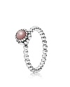 This birthstone ring features a beaded silver band with a polished pink opal solitaire. Perfect worn on its own or stacked with other PANDORA pieces.