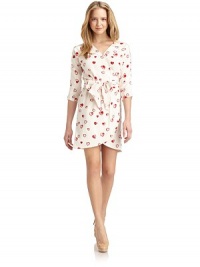 THE LOOKAllover heart print with sequin embellishmentThree-quarter length sleevesWrap front with hook-and-bar and button closureBanded, shirred waist with self beltTHE FITAbout 33 from shoulder to hemTHE MATERIALSilkFully linedCARE & ORIGINDry cleanImportedModel shown is 5'10 (177cm) wearing US size 4. THE LOOKAllover heart print with sequin embellishmentThree-quarter length sleevesWrap front with hook-and-bar and button closureBanded, shirred waist with self beltTHE FITAbout 33 from shoulder to hemTHE MATERIALSilkFully linedCARE & ORIGINDry cleanImportedModel shown is 5'10 (177cm) wearing US size 4.