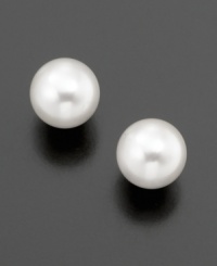 Bask in simple splendor: Belle de Mer's elegant stud earrings feature cultured freshwater pearls (6-1/2-7 mm) set in 14k gold.